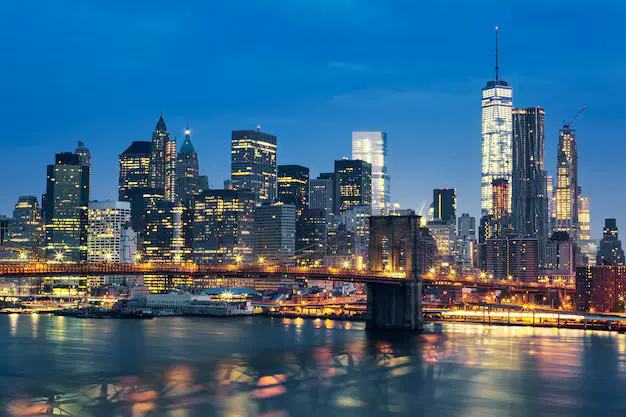 new-york-city-manhattan-midtown-dusk-with-brooklyn-bridge-usa_268835-749